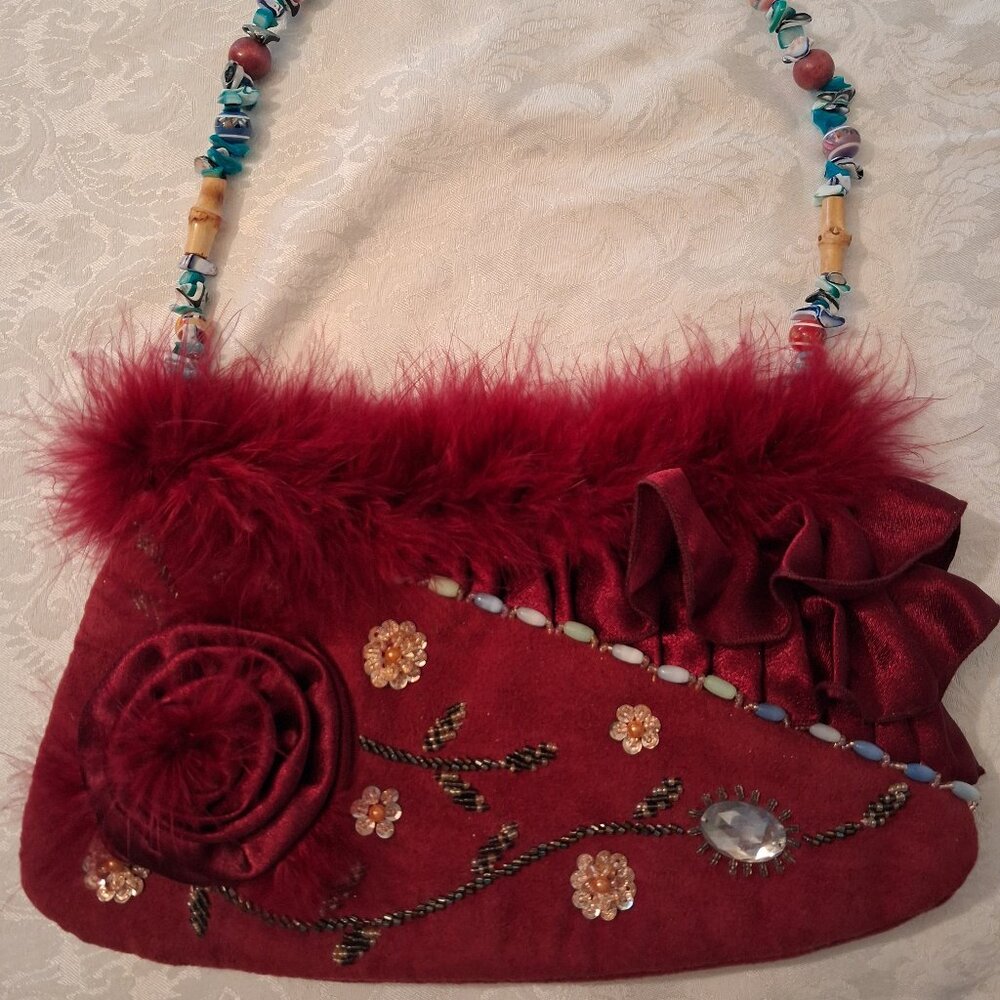 Handmade unique and fun red suede shoulder or wrist bag, beaded and jeweled